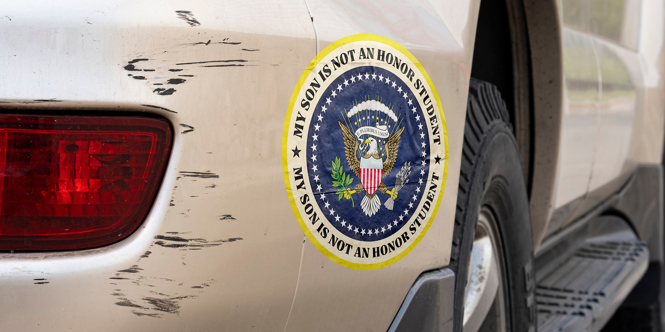 Presidential seal with "my son is not an honor student" printed around it in regards to Hunter Biden being arrested and convicted in court